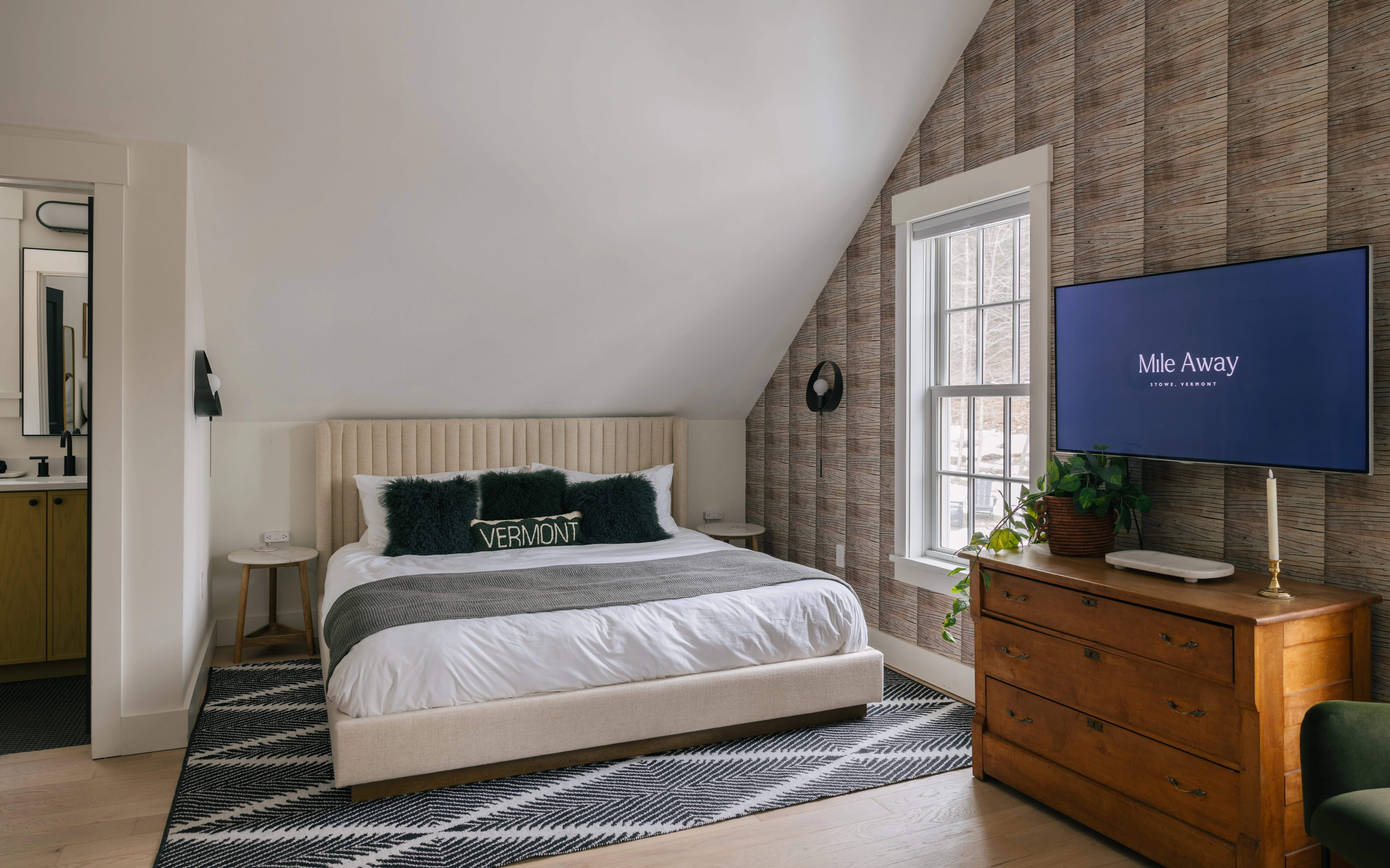 Upstairs king bedroom with fresh 2026 styling and cozy Vermont-inspired decor